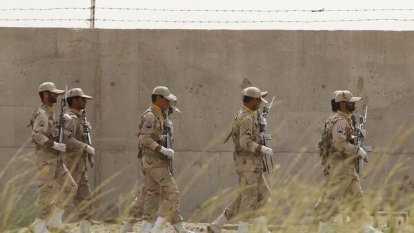 Iranian soldiers keep watch at a drug trafficking patrol post in Milak, southeastern Iran, near the Afghan border, on July 19, 2011 - Sputnik International