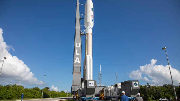 A ULA Atlas V rocket carrying the AEHF-4 mission for the U.S. Air Force is rolled from the Vertical Integration Facility to the launch pad at Cape Canaveral's Space Launch Complex-41. - Sputnik International