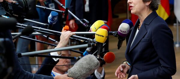 Britain's Prime Minister Theresa May arrives at an European Union leaders summit in Brussels, Belgium October 17, 2018. - Sputnik International