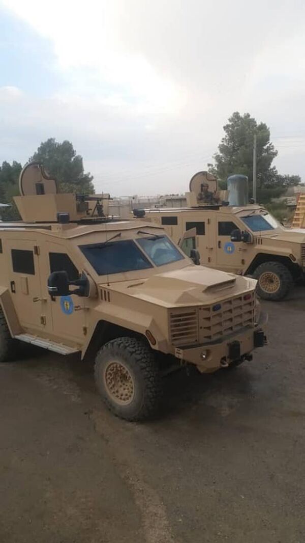 Armored vehicles in Syria's Manbij. Armored vehicles in Syria's Manbij. - Sputnik International