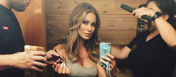 Model Melanie Marden has revealed that she has been receiving death threats since playing FLOTUS in T.I.’s freshly released video Model Melanie Marden has revealed that she has been receiving death threats since playing FLOTUS in T.I.’s freshly released video - Sputnik International