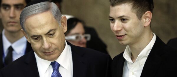 A picture taken on March 18, 2015 shows Israeli Prime Minister Benjamin Netanyahu (L) and his son Yair visiting the Wailing Wall in Jerusalem. The son of Israeli Prime Minister Benjamin Netanyahu faced online criticism on September 9, 2017 after sharing an image on his Facebook page deemed anti-Semitic by critics. A picture taken on March 18, 2015 shows Israeli Prime Minister Benjamin Netanyahu (L) and his son Yair visiting the Wailing Wall in Jerusalem. The son of Israeli Prime Minister Benjamin Netanyahu faced online criticism on September 9, 2017 after sharing an image on his Facebook page deemed anti-Semitic by critics. - Sputnik International