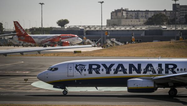 A Ryanair plane is pictured at Humberto Delgado airport in Lisbon on October 3, 2018. - Sputnik International