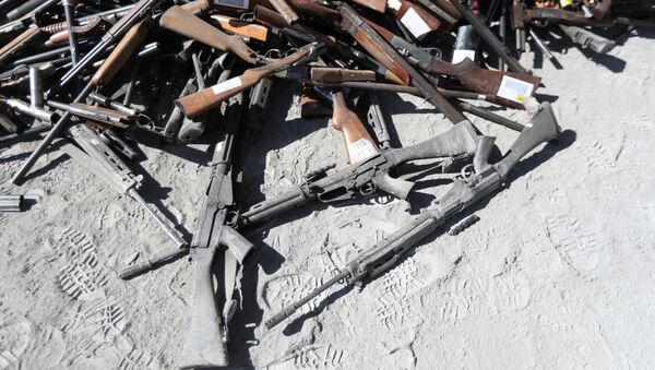 Confiscated weapons are seen before being destroyed - Sputnik International