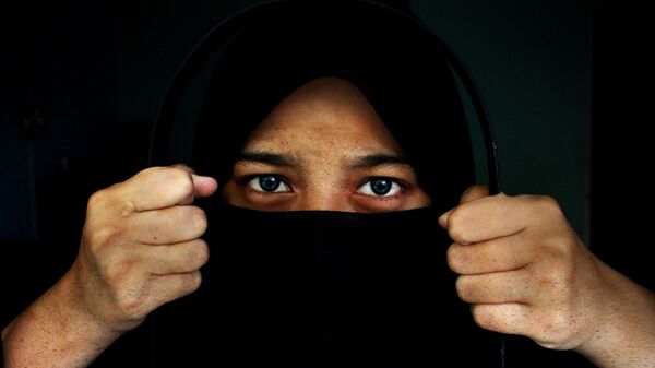 A woman wearing a hijab - Sputnik International