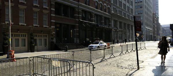 A woman walks past the townhouse (L) in the Tribeca area of Manhattan (File) A woman walks past the townhouse (L) in the Tribeca area of Manhattan (File) - Sputnik International