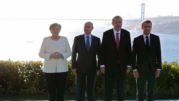 Russian President Vladimir Putin, German Chancellor Angela Merkel, Turkish President Recep Tayyip Erdogan (second from right) and French President Emmanuel Macron (right) during the meeting on Syria in Istanbul, October 27, 2018. - Sputnik International