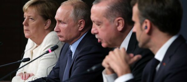 German Chancellor Angela Merkel, Russian President Vladimir Putin, Turkish President Tayyip Erdogan and French President Emmanuel Macron attend a news conference at the Syria summit in Istanbul, Turkey, October 27 2018. German Chancellor Angela Merkel, Russian President Vladimir Putin, Turkish President Tayyip Erdogan and French President Emmanuel Macron attend a news conference at the Syria summit in Istanbul, Turkey, October 27 2018. - Sputnik International
