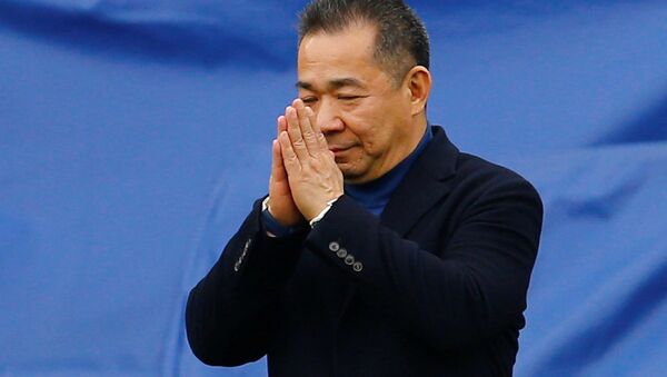 Leicester City chairman Vichai Srivaddhanaprabha reacts as he walks to his helicopter which has landed on the pitch after a game - Sputnik International