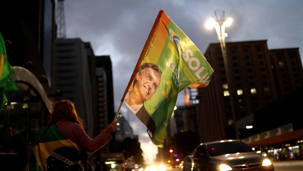 Supporters of Jair Bolsonaro, far-right lawmaker and presidential candidate of the Social Liberal Party (PSL), react during a runoff election in Sao Paulo, Brazil October 28, 2018 - Sputnik International