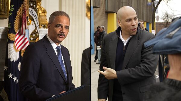 Left: Former US Attorney General Eric Holder. Right: Senator Cory Booker. Left: Former US Attorney General Eric Holder. Right: Senator Cory Booker. - Sputnik International
