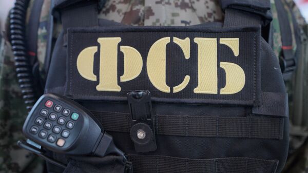 A bulletproof vest and a walkie-talki of an FSB agent - Sputnik International