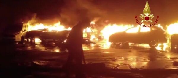 Several hundred brand new Maserati luxury cars have been destroyed in a fire which was caused by flooding in the Italian port of Savona in the Liguria region - Sputnik International