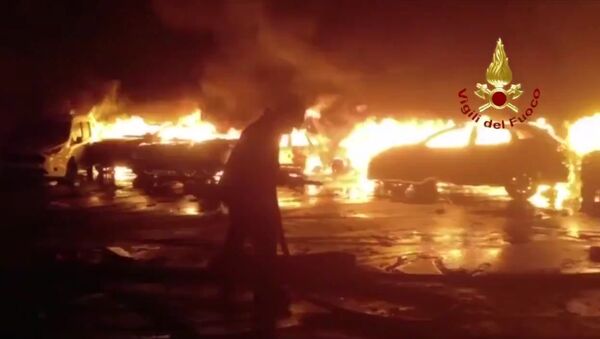 Several hundred brand new Maserati luxury cars have been destroyed in a fire which was caused by flooding in the Italian port of Savona in the Liguria region - Sputnik International