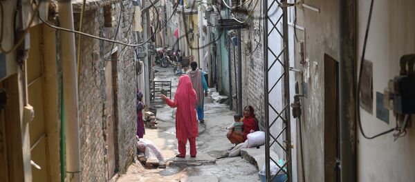 Pakistani women gather at a Christian colony in Islamabad on October 31, 2018, after the Supreme Court decision to overturn the conviction of Christian woman Asia Bibi Pakistani women gather at a Christian colony in Islamabad on October 31, 2018, after the Supreme Court decision to overturn the conviction of Christian woman Asia Bibi - Sputnik International