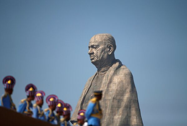 Police officers stand near the Statue of Unity portraying Sardar Vallabhbhai Patel, one of the founding fathers of India, during its inauguration in Kevadia, in the western state of Gujarat, India, October 31, 2018 Police officers stand near the Statue of Unity portraying Sardar Vallabhbhai Patel, one of the founding fathers of India, during its inauguration in Kevadia, in the western state of Gujarat, India, October 31, 2018 - Sputnik International