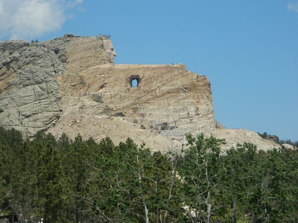 Work began on the Crazy Horse statue in 1948 but this picture, taken in 2015, shows there is still a long way to go Work began on the Crazy Horse statue in 1948 but this picture, taken in 2015, shows there is still a long way to go - Sputnik International
