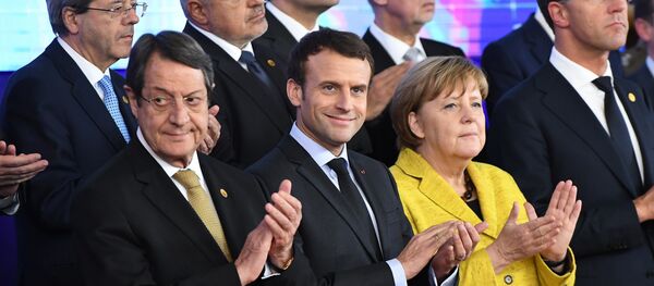 Germany's Chancellor Angela Merkel (2R), France's President Emmanuel Macron (2L), Netherland's Prime minister Mark Rutte (R) and Cyprus' President Nicos Anastasiades (1st-L) attend a ceremony on the Permanent Structure Cooperation (PESCO) on the margin of the first day of a European union summit in Brussels on December 14, 2017. Germany's Chancellor Angela Merkel (2R), France's President Emmanuel Macron (2L), Netherland's Prime minister Mark Rutte (R) and Cyprus' President Nicos Anastasiades (1st-L) attend a ceremony on the Permanent Structure Cooperation (PESCO) on the margin of the first day of a European union summit in Brussels on December 14, 2017. - Sputnik International