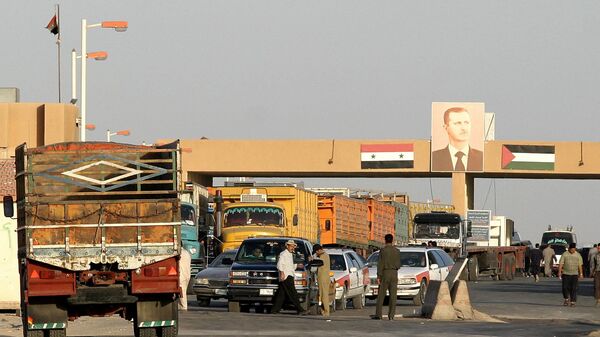 Cars wait at a checkpoint at the Syrian-Iraqi border, 270kms north-east of Damascus (File) - Sputnik International