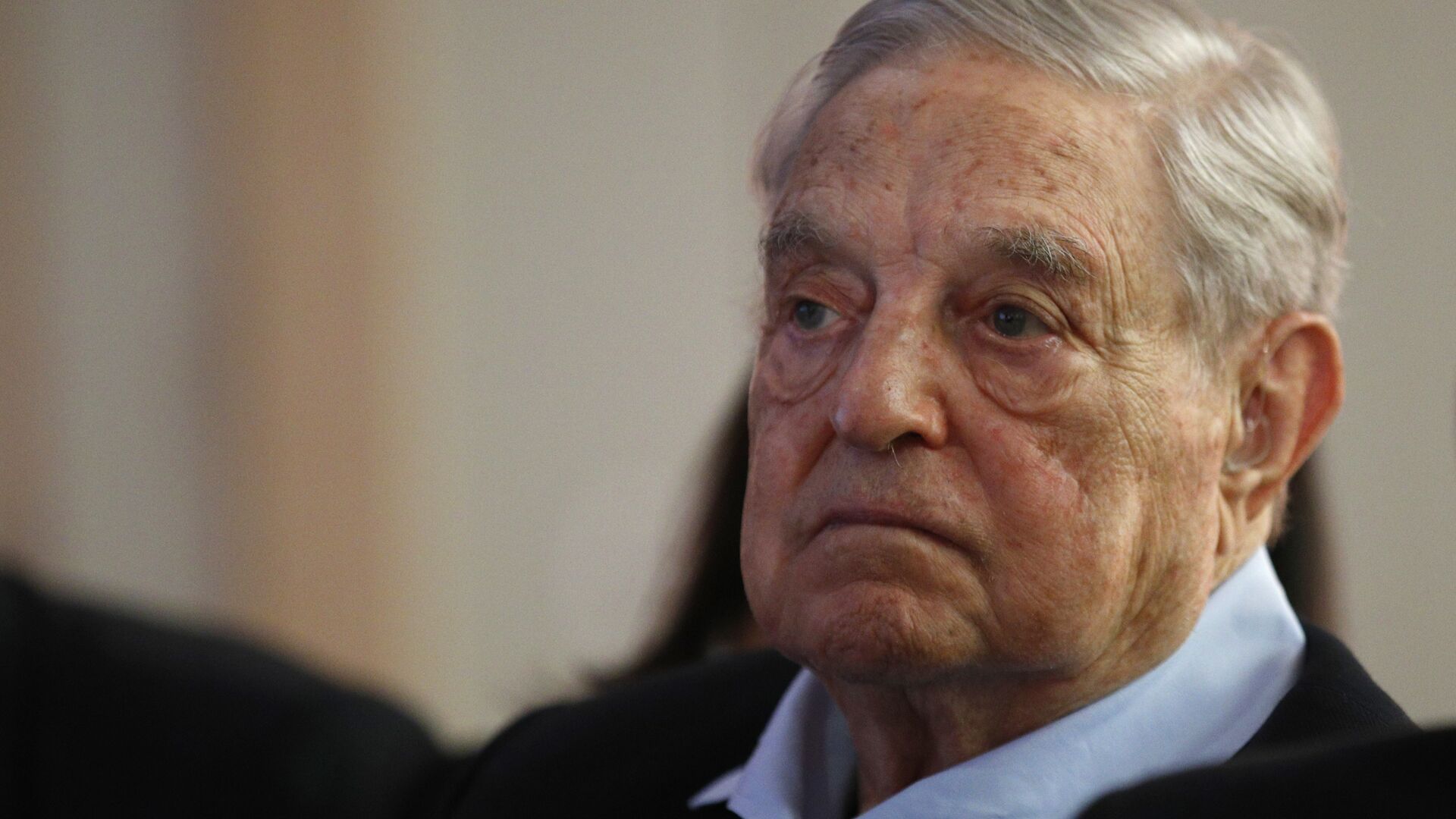 George Soros, Founder and Chairman of the Open Society Foundations listens to the conference after his speech entitled How to save the European Union as he attends the European Council On Foreign Relations Annual Council Meeting in Paris, Tuesday, May 29, 2018 - Sputnik International, 1920, 09.12.2021