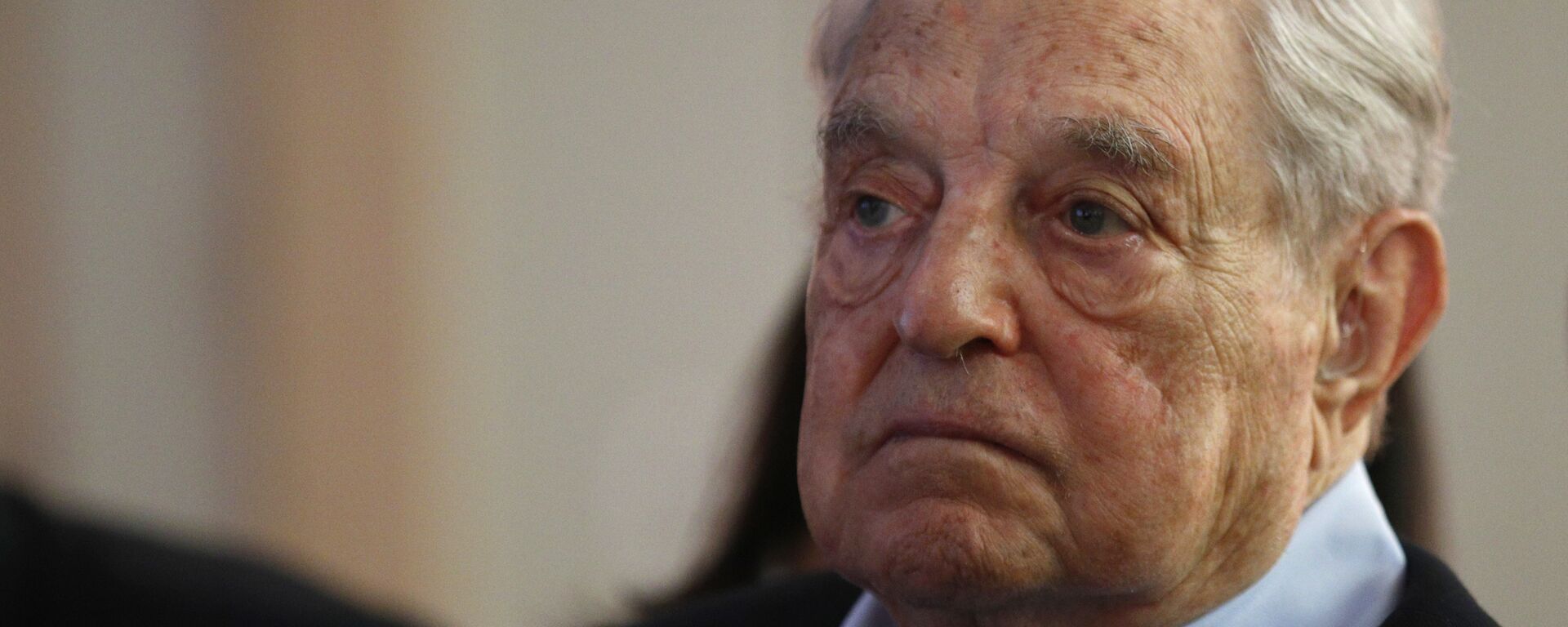 George Soros, Founder and Chairman of the Open Society Foundations listens to the conference after his speech entitled How to save the European Union as he attends the European Council On Foreign Relations Annual Council Meeting in Paris, Tuesday, May 29, 2018 - Sputnik International, 1920, 09.12.2021