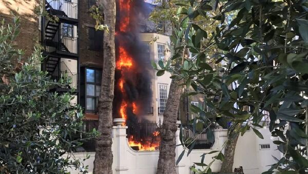 Fire is seen at a building near the Saudi Embassy, in London, Britain, November 2, 2018, in this picture obtained from social media. - Sputnik International