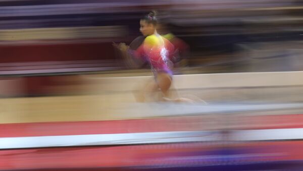 Grace & Poise: Female Athletes Stun World Artistic Gymnastics Championship - Sputnik International