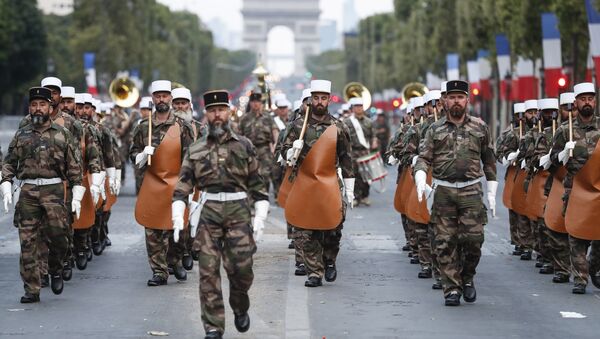 Soldiers of the French Foreign Legion parade on the Champs Elysees avenue during a rehearsal for Bastille Day, early Wednesday, July 11, 2018 in Paris. - Sputnik International