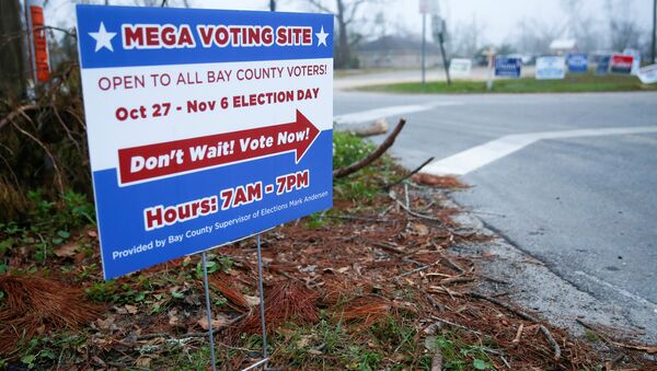 A sign directs voters to a new polling location where Hurricane Michael destroyed many schools and other buildings used as polling stations in the area in Lynn Haven, Florida, U.S., November 5, 2018 - Sputnik International