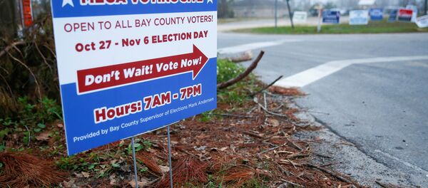 A sign directs voters to a new polling location where Hurricane Michael destroyed many schools and other buildings used as polling stations in the area in Lynn Haven, Florida, U.S., November 5, 2018 - Sputnik International