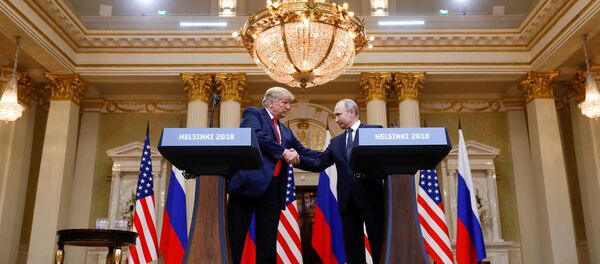 U.S. President Donald Trump and Russia's President Vladimir Putin shake hands during a joint news conference after their meeting in Helsinki, Finland, July 16, 2018 U.S. President Donald Trump and Russia's President Vladimir Putin shake hands during a joint news conference after their meeting in Helsinki, Finland, July 16, 2018 - Sputnik International
