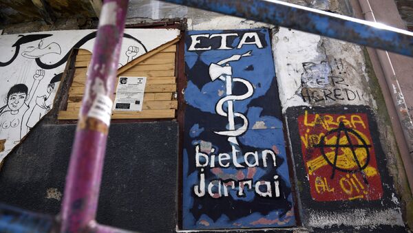 Picture shows a graffiti representing the logo of the armed Basque separatist group ETA in the northern Spanish Basque village of Bermeo - Sputnik International