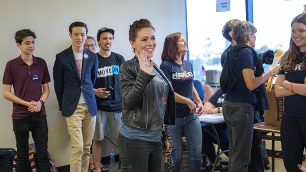 Actor Alyssa Milano visits volunteers at a field office for Congressional District 48 Democratic candidate Harley Rouda on the day of midterm elections, Huntington Beach, California,U.S. November 6, 2018 - Sputnik International