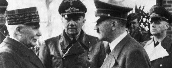 This Oct. 24, 1940 file photo shows German Chancellor Adolf Hitler, right, shaking hands with Head of State of Vichy France Marshall Philippe Petain, in occupied France. This Oct. 24, 1940 file photo shows German Chancellor Adolf Hitler, right, shaking hands with Head of State of Vichy France Marshall Philippe Petain, in occupied France. - Sputnik International