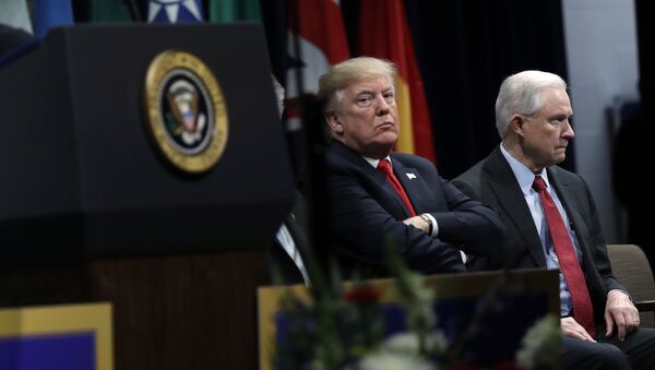 President Donald Trump, listens to FBI Director Christopher Wray speak, with Attorney General Jeff Sessions, right, at the FBI National Academy graduation ceremony, Friday, Dec. 15, 2017, in Quantico, Va. - Sputnik International