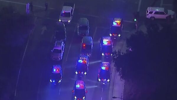 In this image made from aerial video, police vehicles block an intersection in the vicinity of a shooting in Thousand Oaks, California, early Thursday, Nov. 8, 2018 - Sputnik International