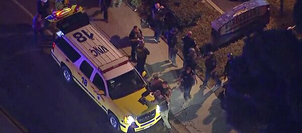 This image made from aerial video show officers around a Police SUV in the vicinity of a shooting in Thousand Oaks, California, early Thursday, Nov. 8, 2018 - Sputnik International