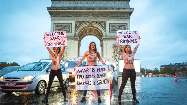 Femen activists protest against war criminals in Paris, France - Sputnik International