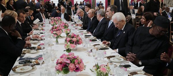 Russian President Vladimir Putin during a working lunch hosted by French President Emmanuel Macron for heads of state and government invited to attend events to mark 100 years since the end of WWI. - Sputnik International