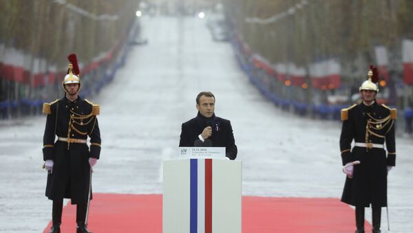 French President Emmanuel Macron delivers a speech during a ceremony at the Arc de Triomphe in Paris as part of the commemorations marking the 100th anniversary of the 11 November 1918 armistice, ending World War I, Sunday, Nov. 11, 2018 - Sputnik International