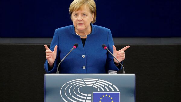 German Chancellor Angela Merkel addresses the European Parliament during a debate on the future of Europe, at the European Parliament in Strasbourg, France, November 13, 2018 - Sputnik International