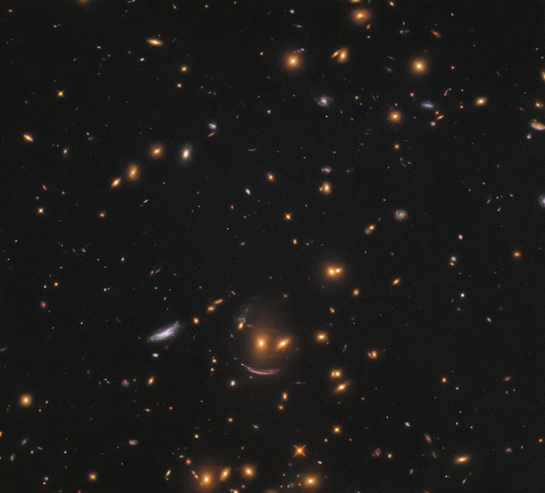 Hubble Space Telescope captures galaxy cluster that resembles a smiley face Hubble Space Telescope captures galaxy cluster that resembles a smiley face - Sputnik International