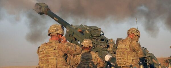 U.S. Army soldiers with Battery C, 1st Battalion, 320th Field Artillery Regiment, Task Force Strike, execute a fire mission in northern Iraq on Aug. 14 2016 U.S. Army soldiers with Battery C, 1st Battalion, 320th Field Artillery Regiment, Task Force Strike, execute a fire mission in northern Iraq on Aug. 14 2016 - Sputnik International