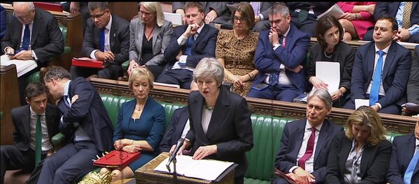 A still image from video footage shows Britain's Prime Minister Theresa May speak about Brexit, in the House of Commons, in central London - Sputnik International