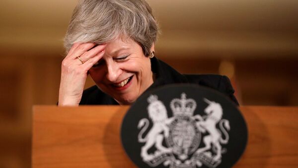 Britain's Prime Minister Theresa May reacts during a news conference at Downing Street in London, Britain, November 15, 2018 - Sputnik International