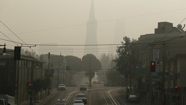 The Transamerica Pyramid is obscured by smoke and haze from wildfires Friday, Nov. 16, 2018, in San Francisco. - Sputnik International
