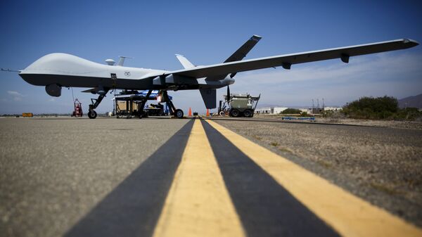 A General Atomics MQ-9 Reaper stands on the runway during Black Dart, a live-fly, live fire demonstration of 55 unmanned aerial vehicles, or drones, at Naval Base Ventura County Sea Range, Point Mugu, near Oxnard, California July 31, 2015 - Sputnik International