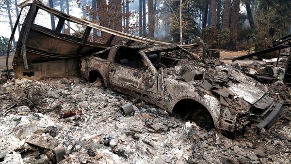 A car destroyed by the Camp Fire is seen in Paradise, California - Sputnik International