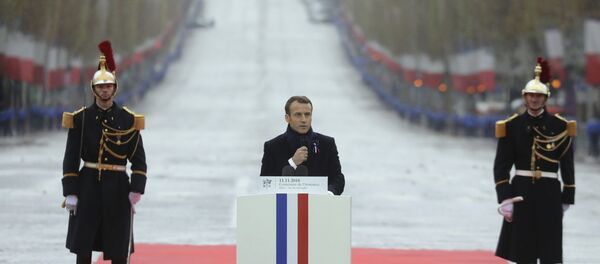 French President Emmanuel Macron delivers a speech during a ceremony at the Arc de Triomphe in Paris as part of the commemorations marking the 100th anniversary of the 11 November 1918 armistice, ending World War I, Sunday, Nov. 11, 2018 - Sputnik International