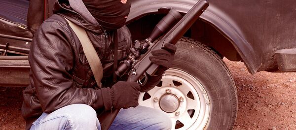 A man wearing a balaclava A man wearing a balaclava - Sputnik International